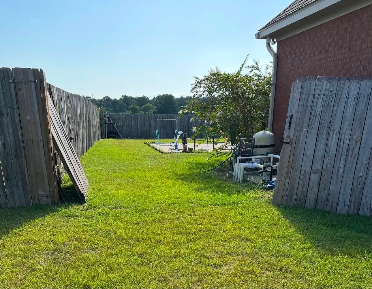 Before: wooden privacy fence gate broken and leaning open